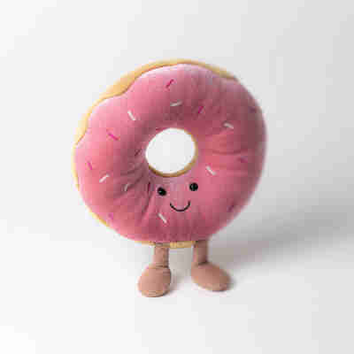 Détail peluche donut douce avec glaçage rose Jellycat