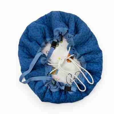 Détail du système de fermeture du tapis sac Puce & Pilou