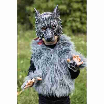 Enfant portant un masque de loup-garou réaliste Great Pretenders avec gilet en fausse fourrure