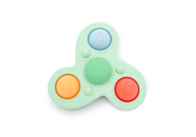 Space Spinner Little L en silicone vert pastel avec formes spatiales