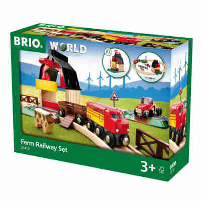 Circuit de la Ferme Brio avec train rouge, tracteur et vache