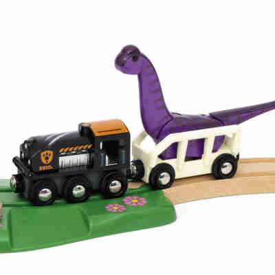 Wagon transportant un dinosaure sur un circuit Brio