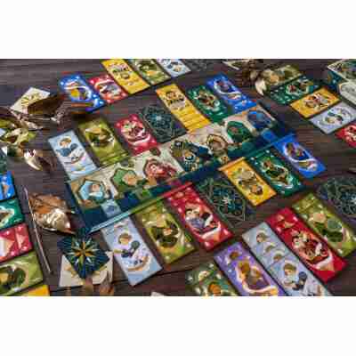 Partie en cours du jeu Courtisans avec tapis et cartes