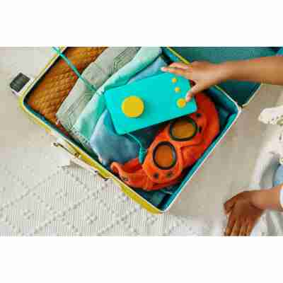 Conteuse Lunii rangée dans une valise pour les voyages