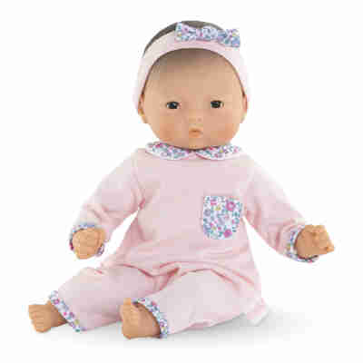 Poupon Bébé Câlin Mila Corolle assis avec pyjama rose et bandeau fleuri