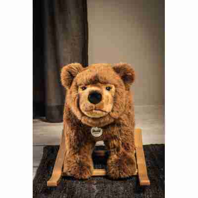 Ptit Loustic – Magasin de jeux et jouets à Saint-Étienne 16 Urs l'ours brun à bascule Steiff vu de face dans une chambre d'enfant