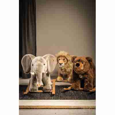 Ours, lion et éléphant à bascule Steiff présentés ensemble