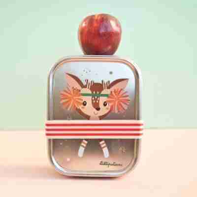 Boîte repas Wonder Stella Rose Lilliputiens posée avec une pomme sur le dessus