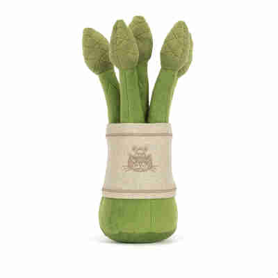 Peluche Amuseables Asparagus Jellycat vue de face avec sourire et deux pieds bruns
