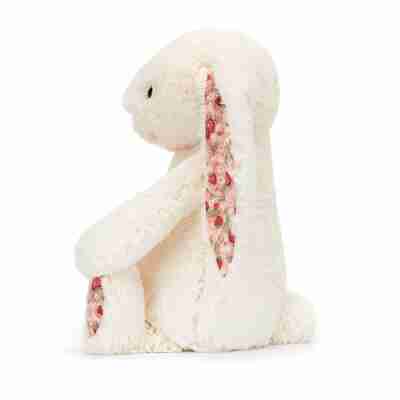 Ptit Loustic – Magasin de jeux et jouets à Saint-Étienne 6 Peluche lapin Blossom Bunny Berry Jellycat vue de profil avec longue oreille fleurie