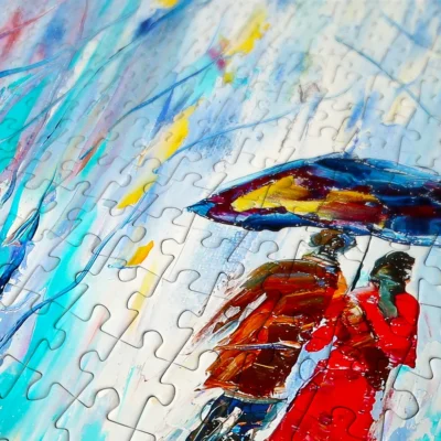 Gros plan sur les pièces du puzzle Rainy Love autour du couple abrité sous son parapluie