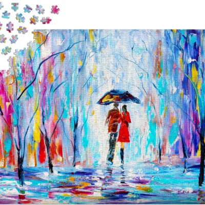 Ptit Loustic – Magasin de jeux et jouets à Saint-Étienne 8 Puzzle Enjoy Rainy Love de 1000 pièces en cours d’assemblage avec pièces disposées autour