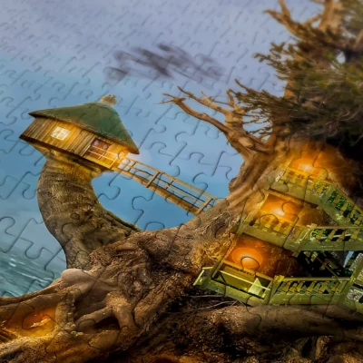 Détail des pièces du puzzle The Magic Lighthouse montrant la maison éclairée aménagée dans l’arbre