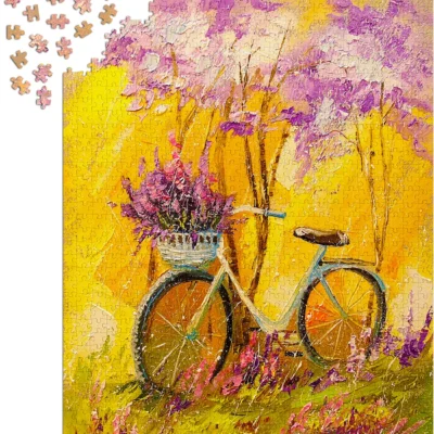 Ptit Loustic – Magasin de jeux et jouets à Saint-Étienne 6 Puzzle Enjoy My Bike de 1000 pièces en cours d’assemblage avec pièces disposées autour