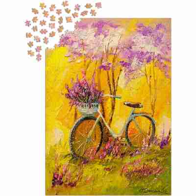 Ptit Loustic – Magasin de jeux et jouets à Saint-Étienne 6 Puzzle Enjoy My Bike de 1000 pièces en cours d’assemblage avec pièces disposées autour