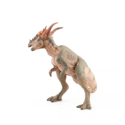 Stygimoloch Papo vu de profil avec peau texturée, pattes arrière puissantes et tête cornue