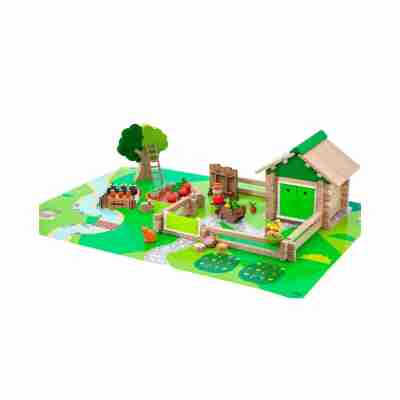 Maison et jardin Jeujura construits sur le tapis de jeu avec potager et accessoires